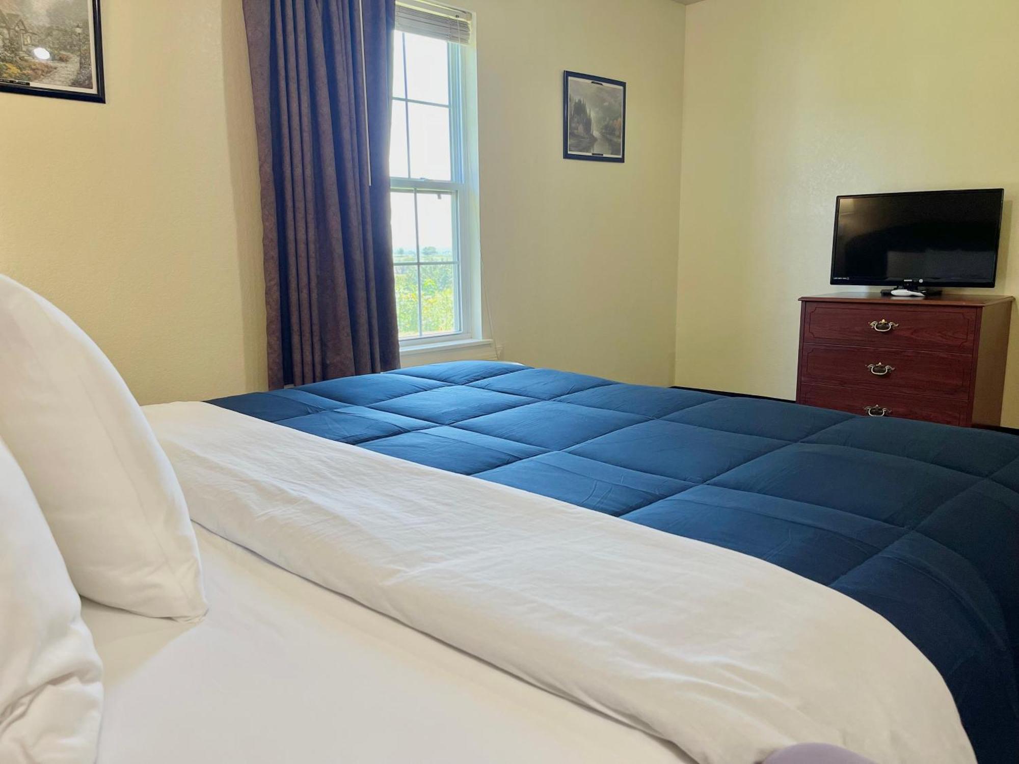 Candlelight Inn & Suites Hwy 69 Near ماكاليستر المظهر الخارجي الصورة